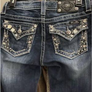 Women’s miss me, boot, cut jeans, frayed bottoms, button replaced